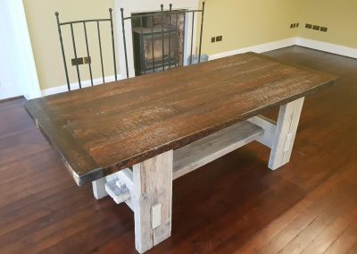 natural oak effect dining table base, dark mahogany effect reclaimed table top