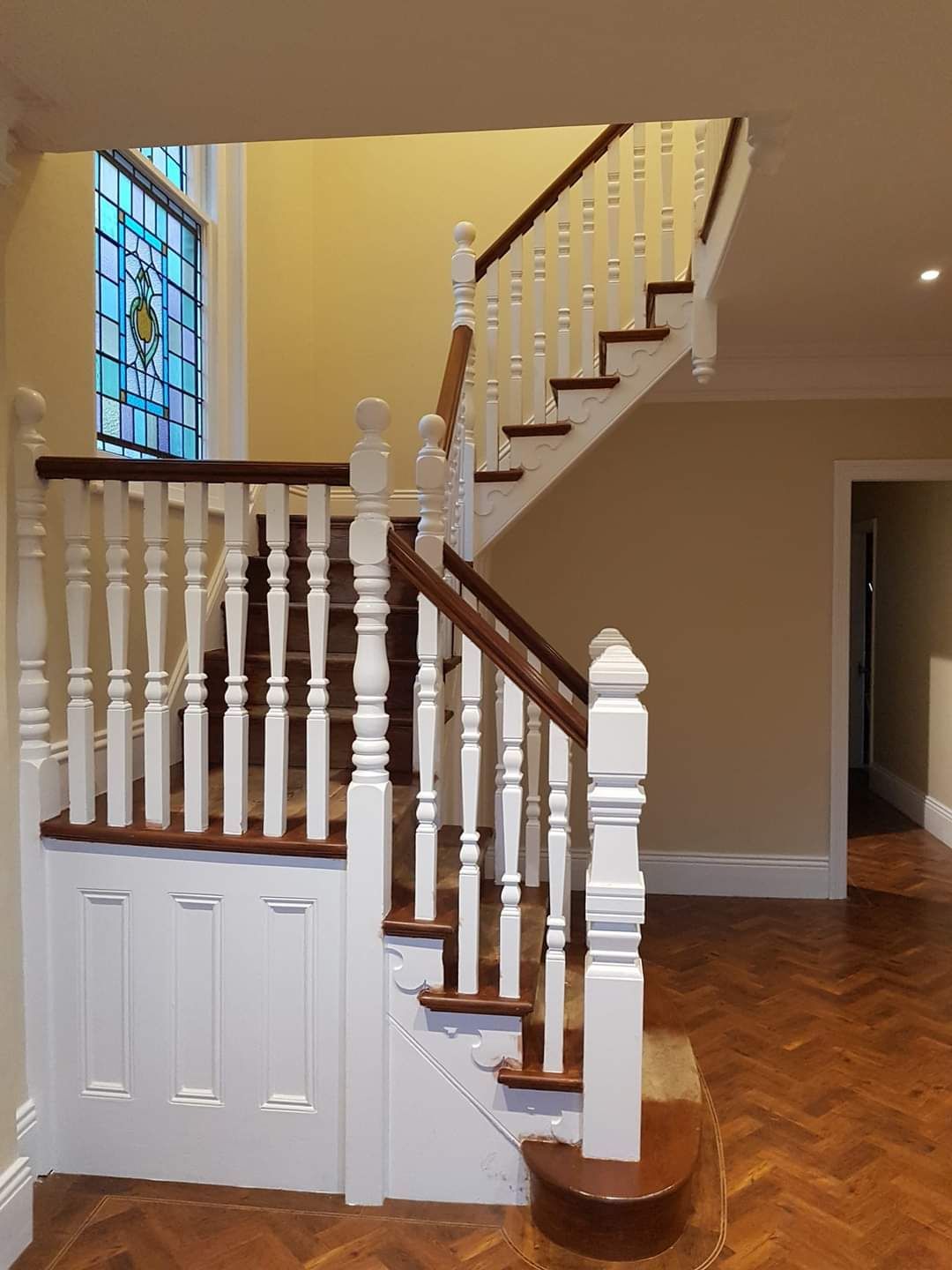 Wooden staircase with fabric floor & landings
