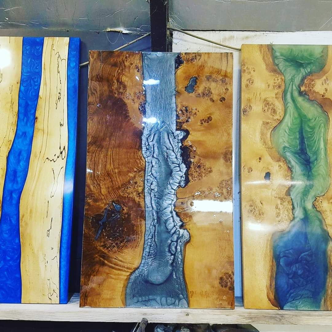 Different wooden tabletops with resin inlays, silver, blue, green , river resin , bur oak, live edge, coffee tables