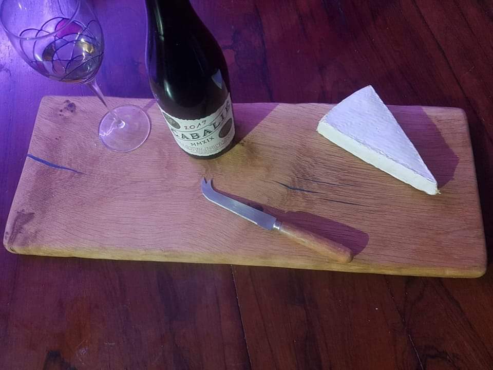 Oak & resin chopping / serving / cheese board with cheese and wine