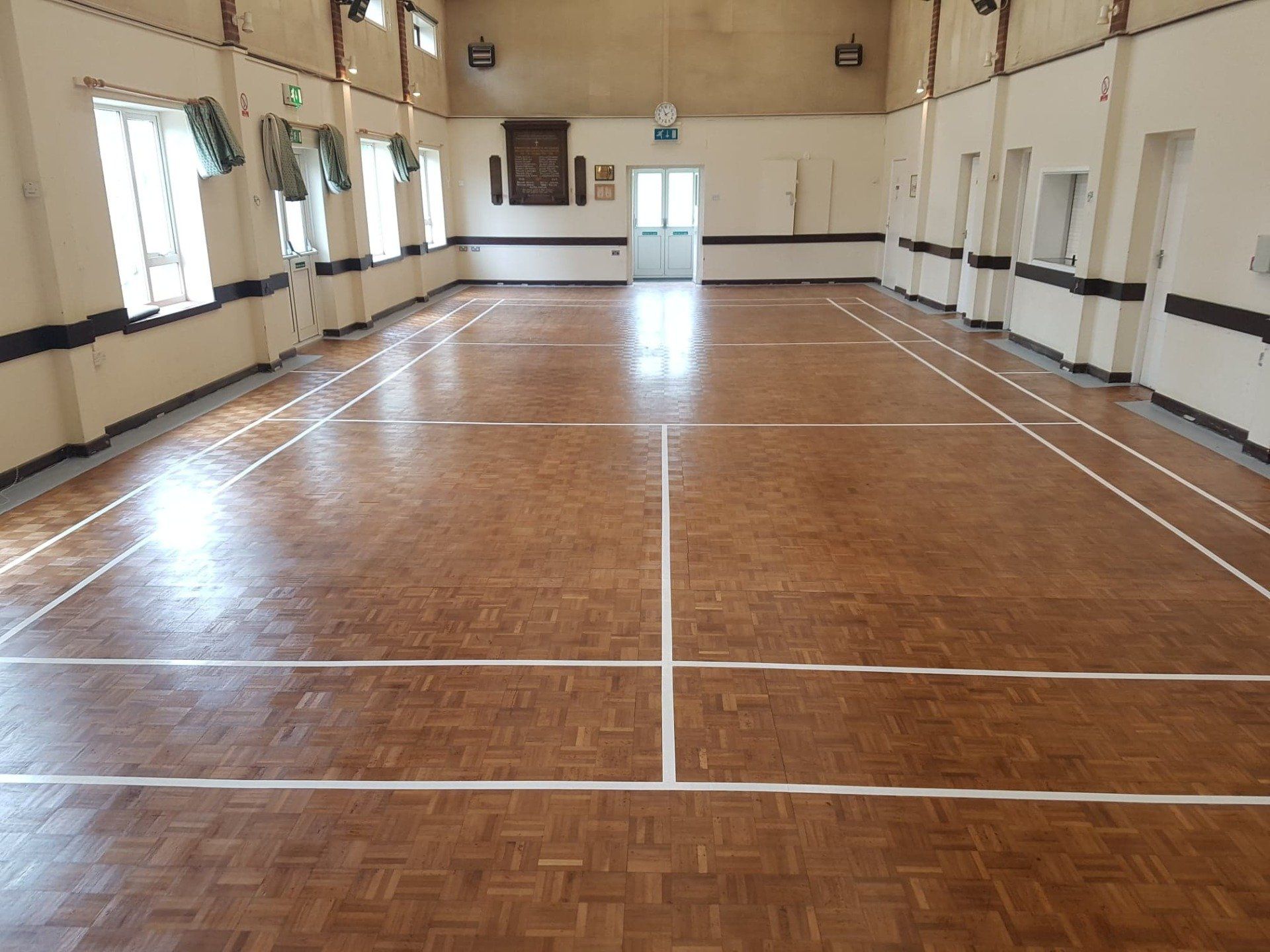 Restored wooden floor in large hall