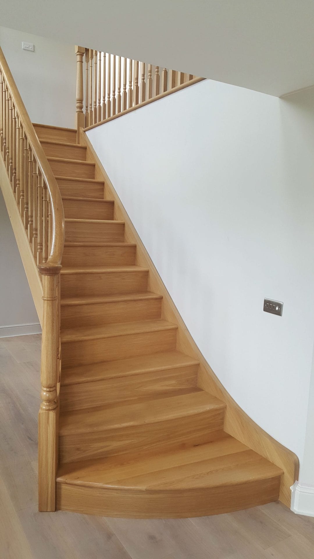 Bespoke curved oak staircase treads , handrail and spindles, designer staircase Oak bannister, new oak staircase, natural oak reads, oak handrail