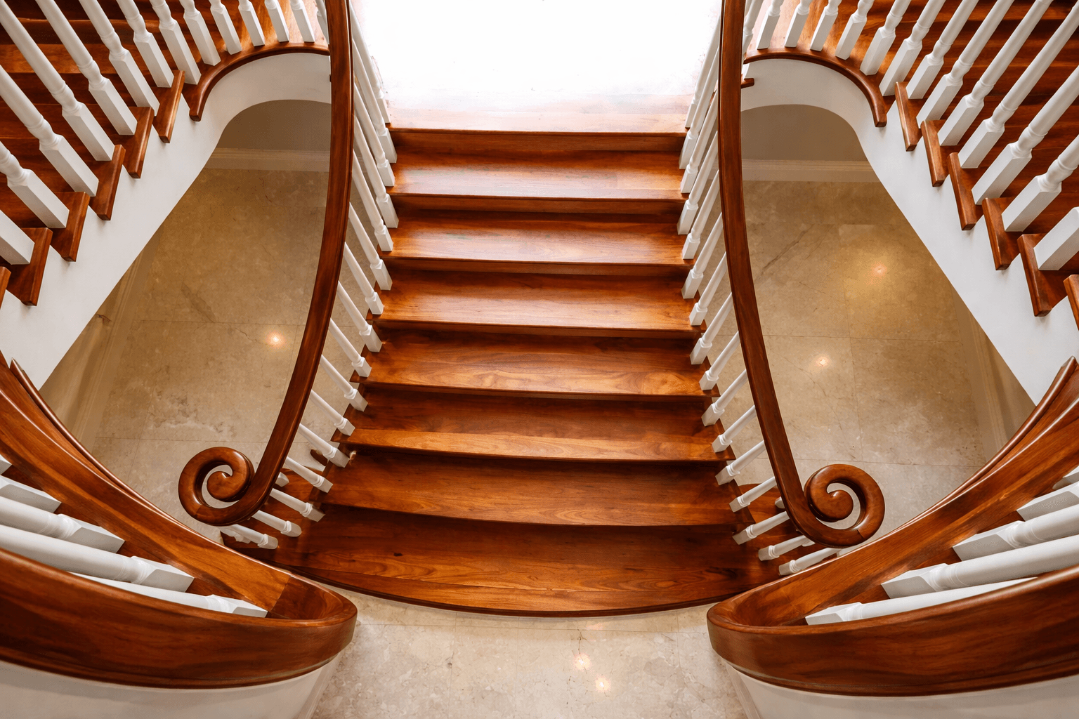 Walnut staircase restored top view , white painted spindles, bannisters, Wooden staircase restoration near Basingstoke, Hartley Wintney, Hook, Rotherwick,